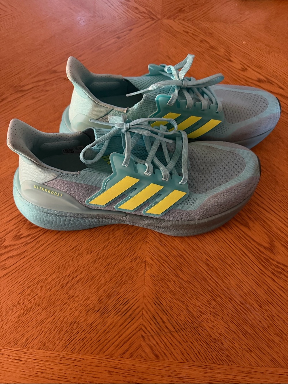 Unisex Adidas Teal Sneakers with Yellow Stripes